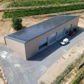 Bâtiment solaire monopente 100 kWc pour stockage matériel Triangle Énergie